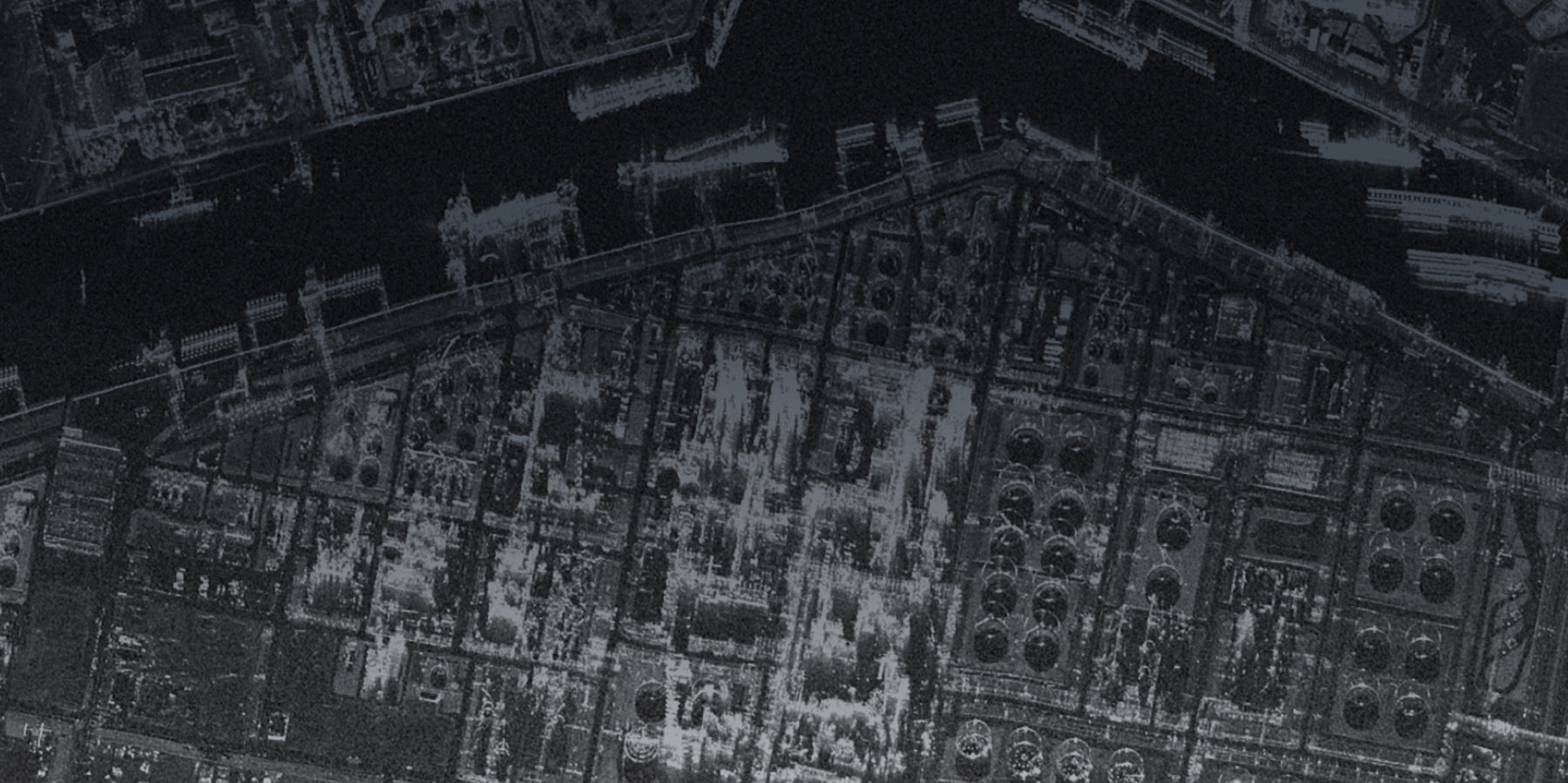 Black and white satellite image of a dock